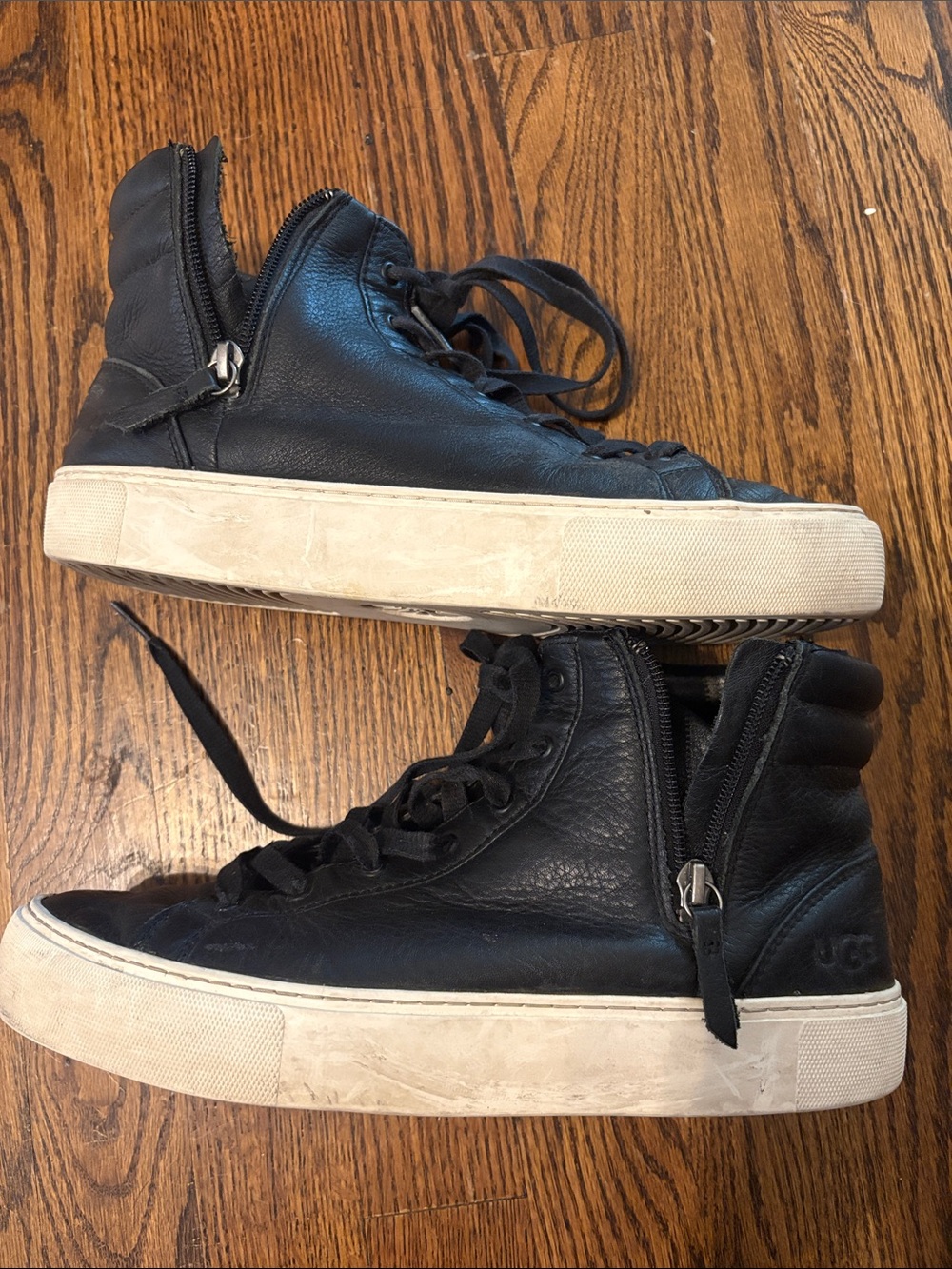 UGG Women’s Black Leather High-Top Sneakers with Side Zipper